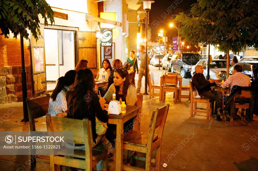 People sitting at an outdoors Cafe in the upmarket neighrbourhood of Jabal Amman, Amman, Jordan