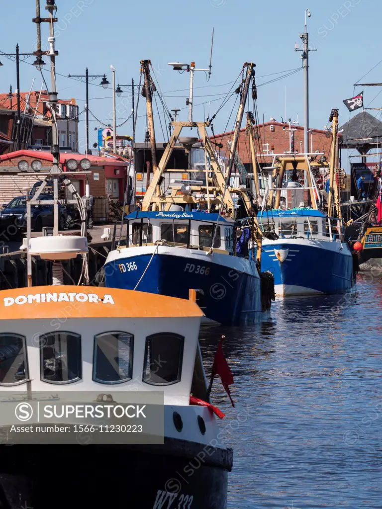 Fishing boat in the Harbour of Whitby, North Yorkshire coast, UK.