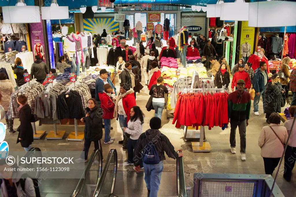 Shoppers in Old Navy in the Herald Square shopping district in New York looking for bargains on Thanksgiving Day Many retailers are opening their door...