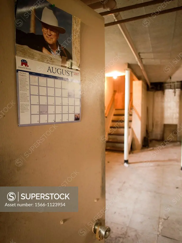 Republican calender in musty basement inside of a foreclosed house in Bronx, New York, United States