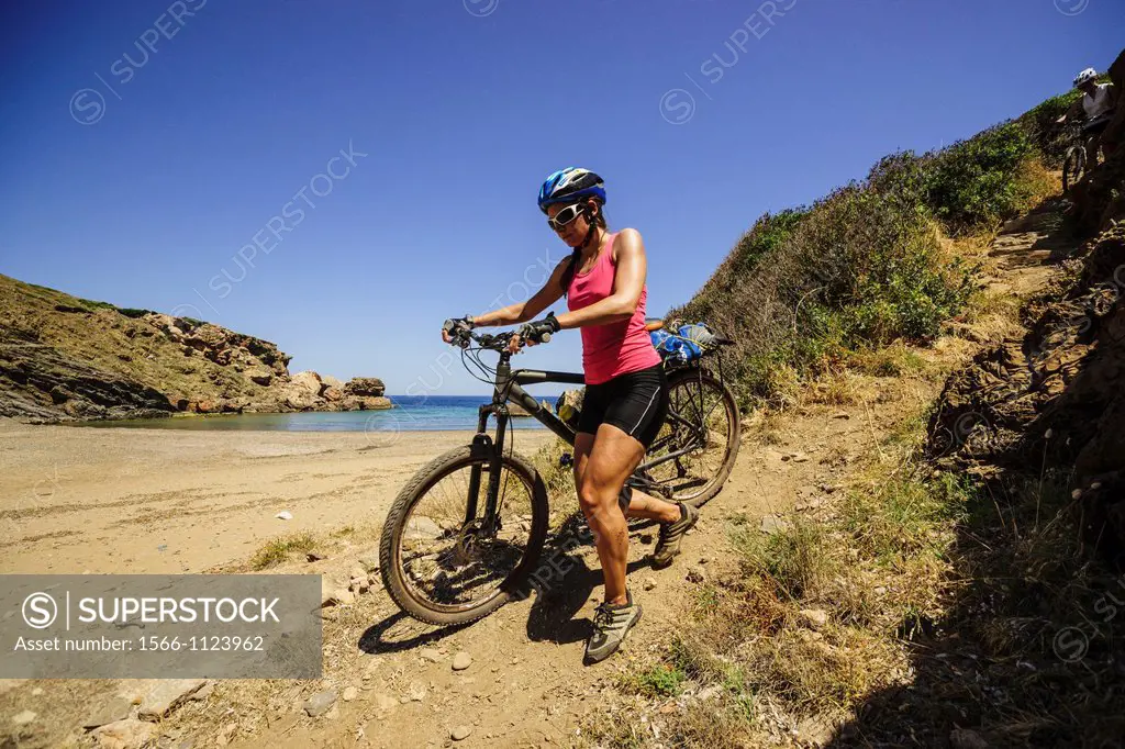 Cyclists, Cala En Calderer, Ferreries, Menorca, Balearic Islands, Spain, Europe