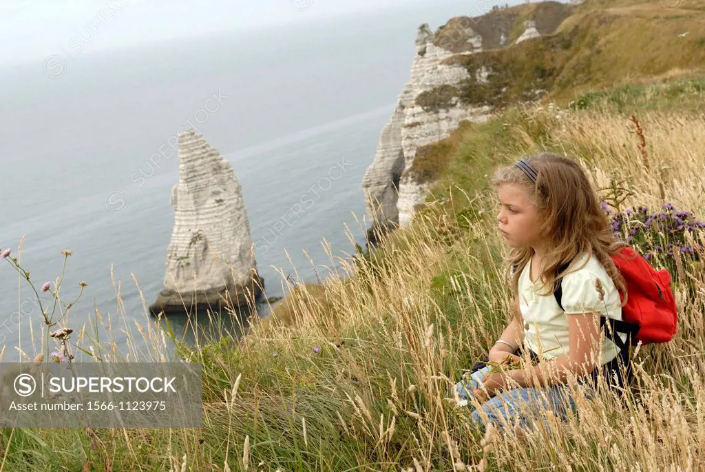little girl on the top of cliff, Etretat, Cote d´Albatre, Pays de Caux, Seine-Maritime department, Upper Normandy region, France, Europe