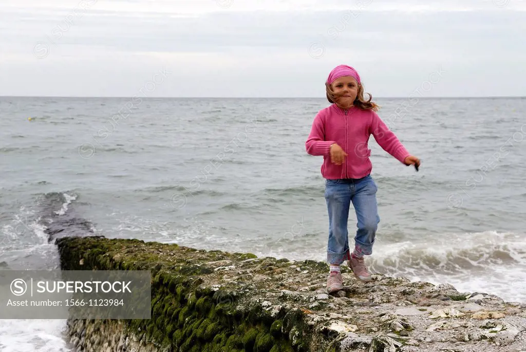 little girl on the beach of Etretat, Cote d´Albatre, Pays de Caux, Seine-Maritime department, Upper Normandy region, France, Europe