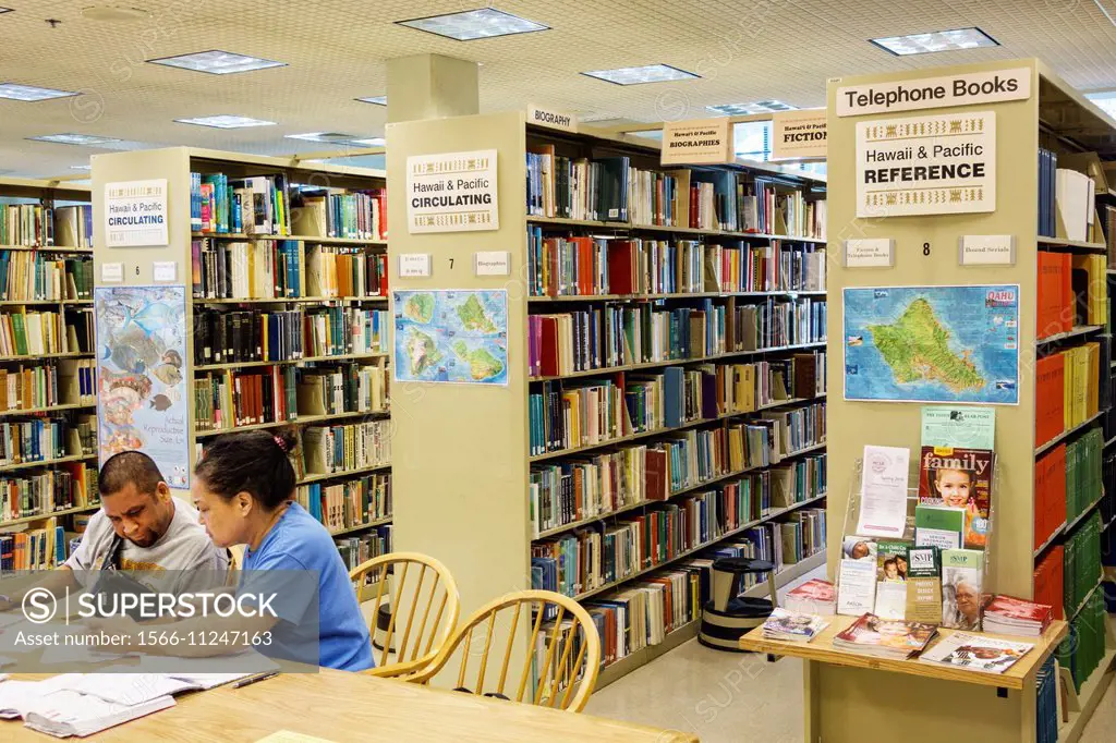 Hawaii, Hawaiian, Honolulu, Hawaii State Library, book shelves, Black, man, woman, couple.