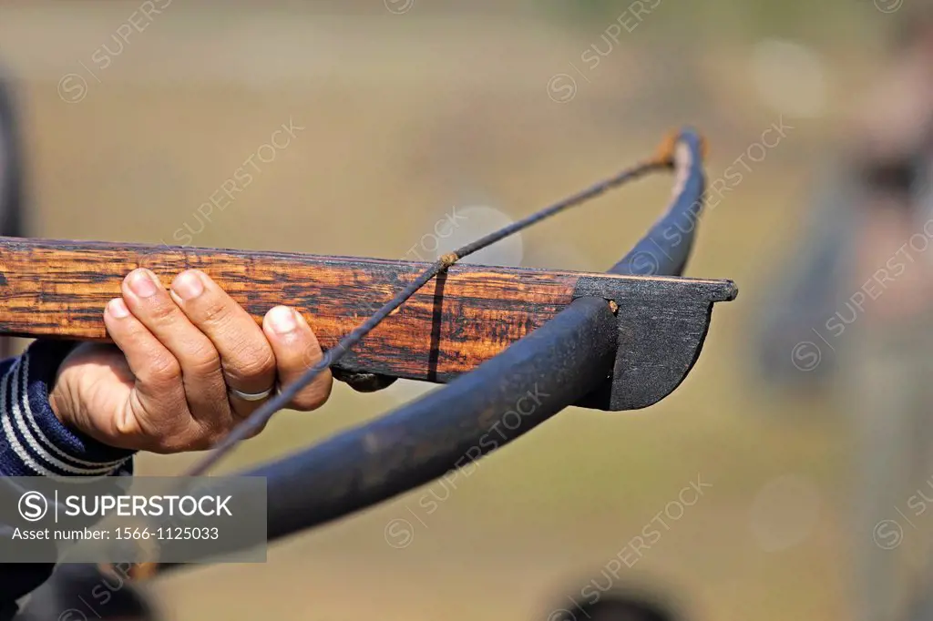 Tribe, man perform Traditional Crossbow Competition at Namdapha Eco Cultural Festival, Miao, Arunachal Pradesh, India