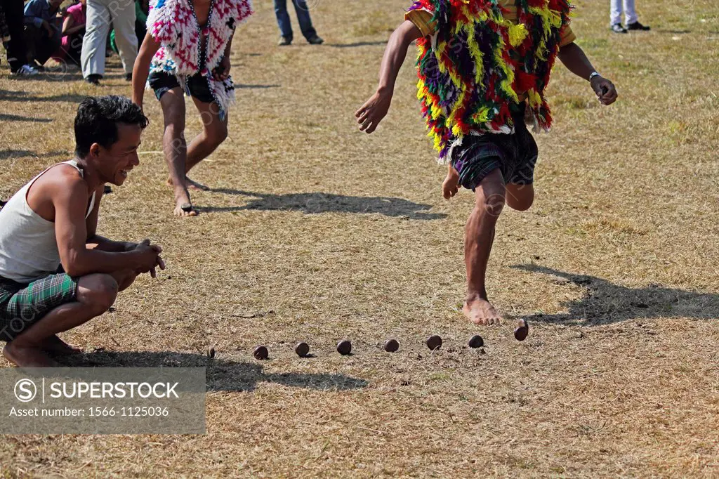 tribal playing stone kancha game at Namdapha Eco Cultural Festival, Miao, Arunachal Pradesh, India