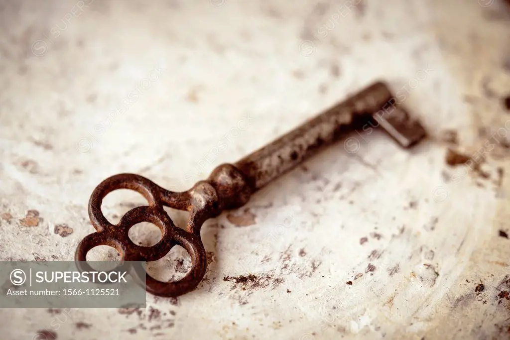 Old key on a distressed background