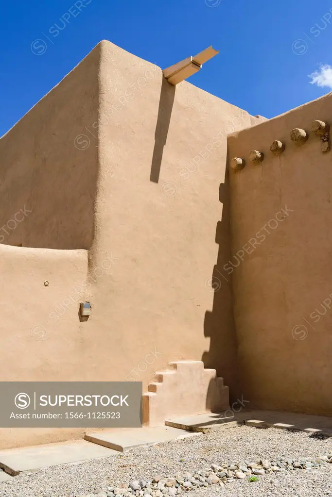 Detail of mission church built in the adobe or Indian pueblo style, Ranchos de Taos, New Mexico, USA