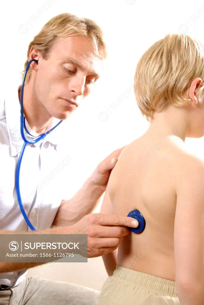 Paediatric examination  Doctor listening to a young boy´s chest