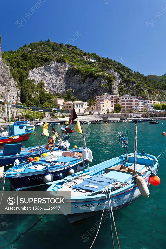 Fishing boats in the picturesque harbor of Maiori, Italy