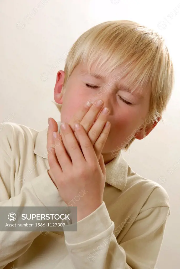 Young boy coughing