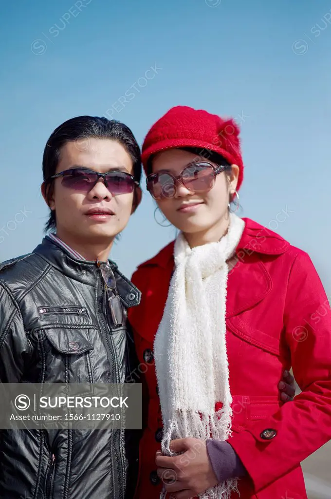 A young fashionable Vietnamese couple