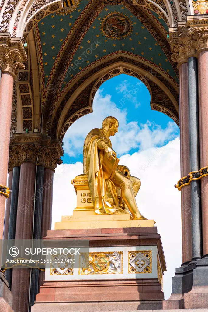 Central golden figure of Prince Albert at the Albert Memorial, London, England