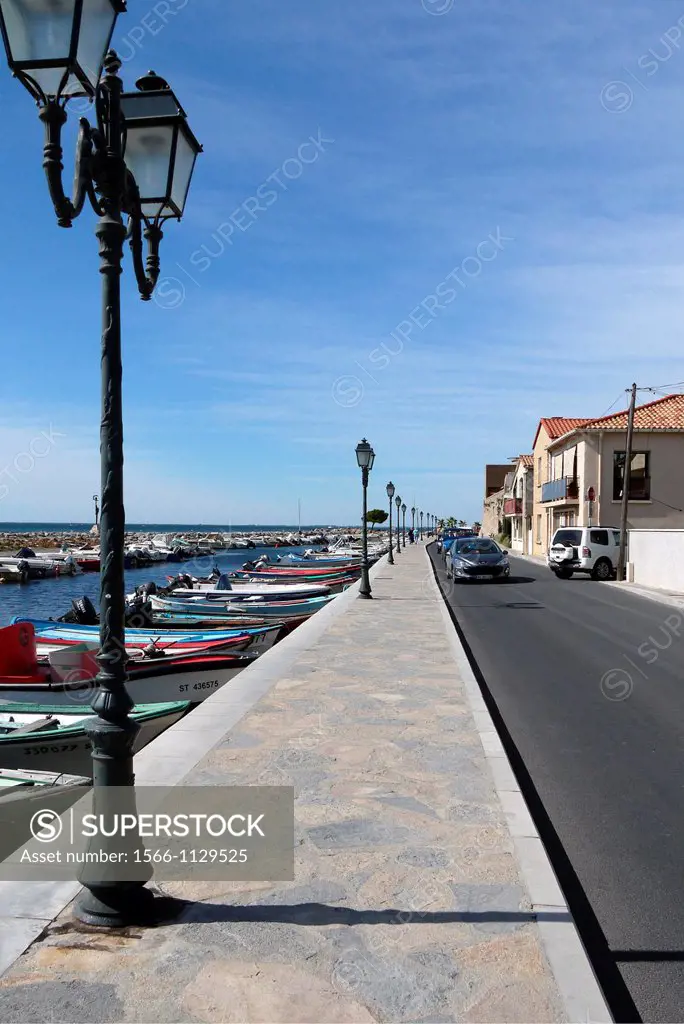 The old village of Meze, on the Bassin du Thau a large salt water lake, is known for its oyster and mussel industry