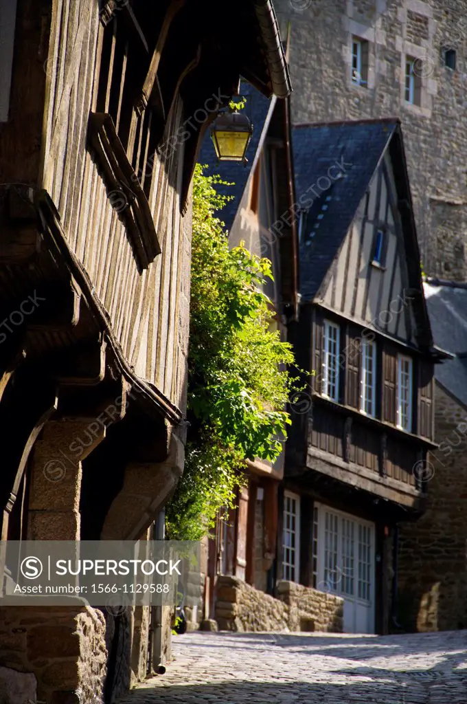 Medieval corbelled and half timbered mansions, in cobbled street, Old Town, Dinan, Brittany, Cotes d´Armor, France