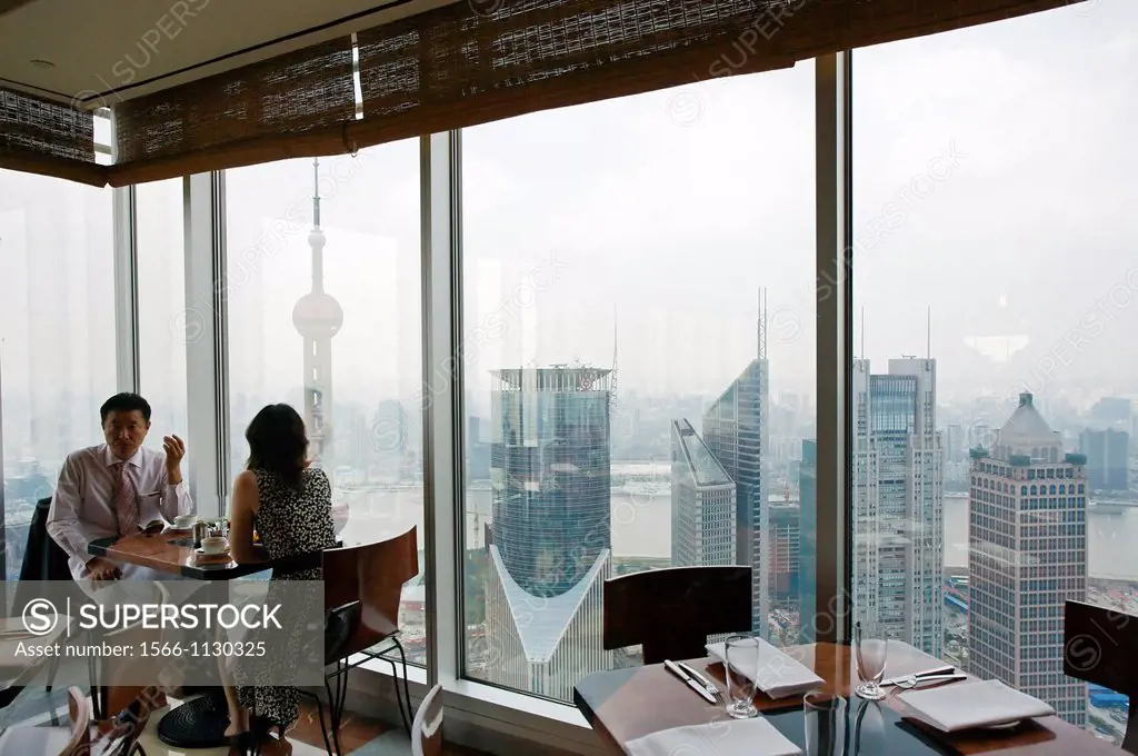 Restaurant, view of Pudong from the Jin Mao Tower, Hotel Hyatt, Shanghai, China.