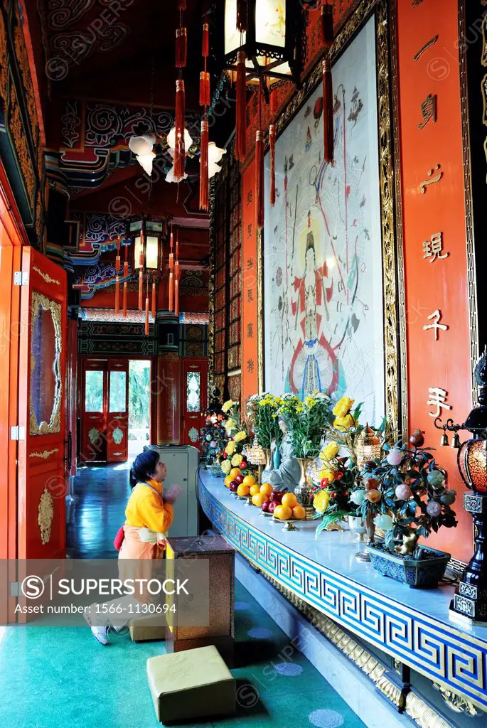 Po Lin Monastery  Believer praying in front of the altar