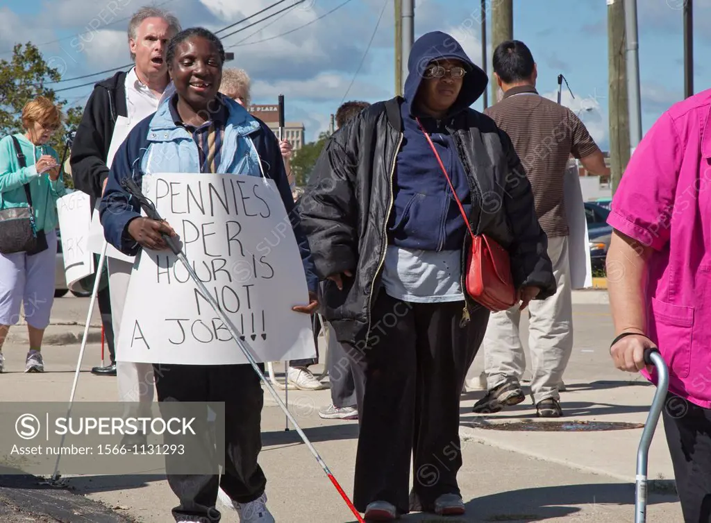 Dearborn, Michigan - Members of the National Federation of the Blind picket a Goodwill Industries thrift store, protesting Goodwill´s practice of payi...