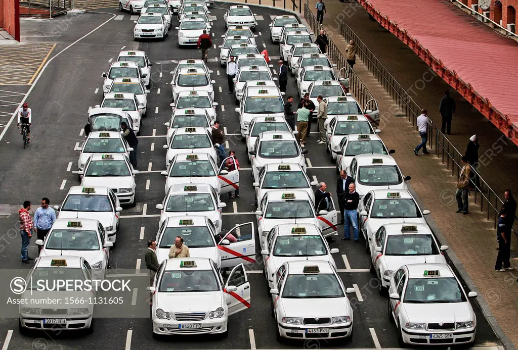 Taxi cabs queing for customers at Atocha stations, Madrid, Spain