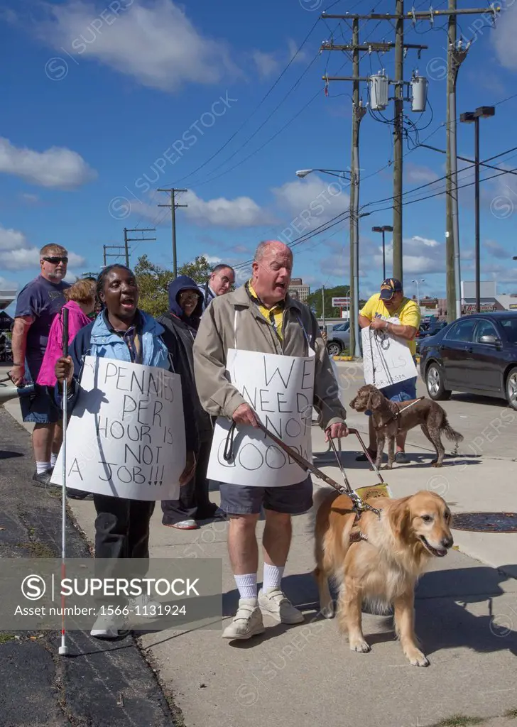 Dearborn, Michigan - Members of the National Federation of the Blind picket a Goodwill Industries thrift store, protesting Goodwill´s practice of payi...