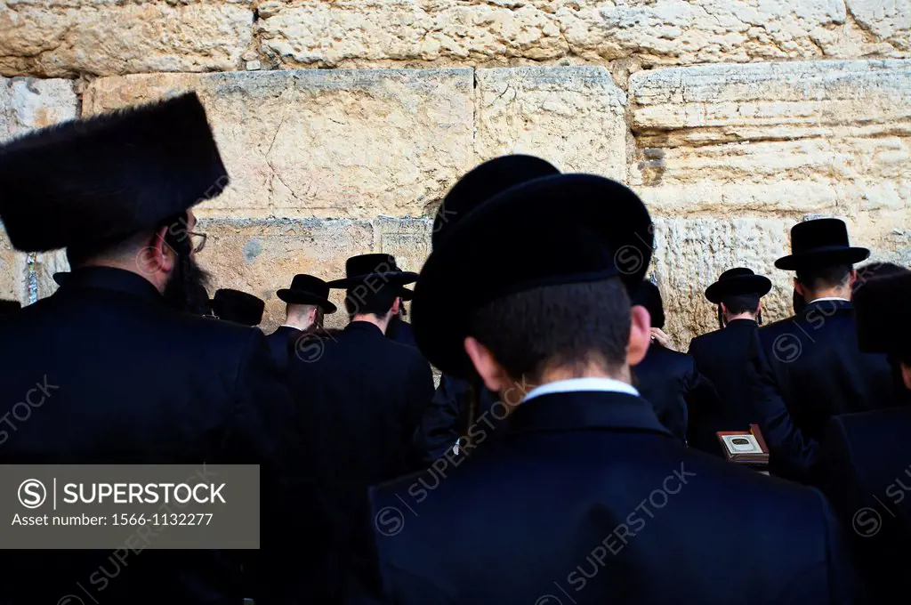 Orthodox Jews praying by the Wailing Wall ´Western Wall´ , Jerusalem  Israel.
