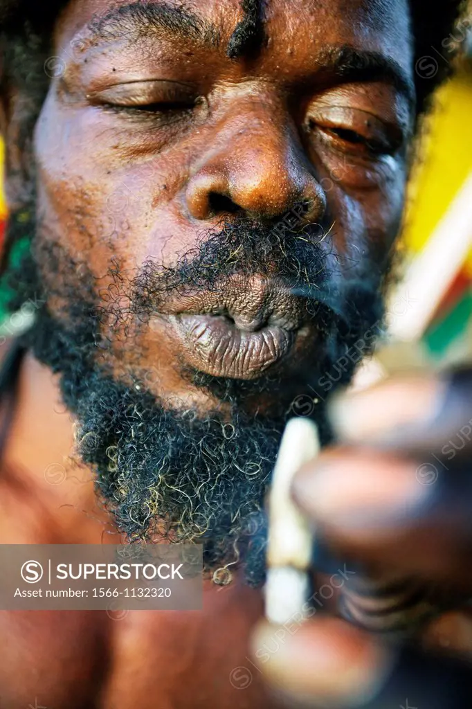 Smoking a joint ´Marijuana´, Port Antonio, Jamaica, West Indies, Caribbean, Central America.