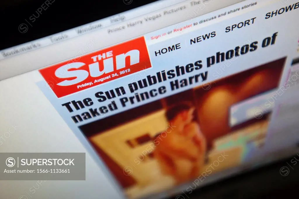 The website of Rupert Murdoch´s The Sun newspaper showing naked photos of the royal family´s Prince Harry naked with a woman in Las Vegas is seen on F...
