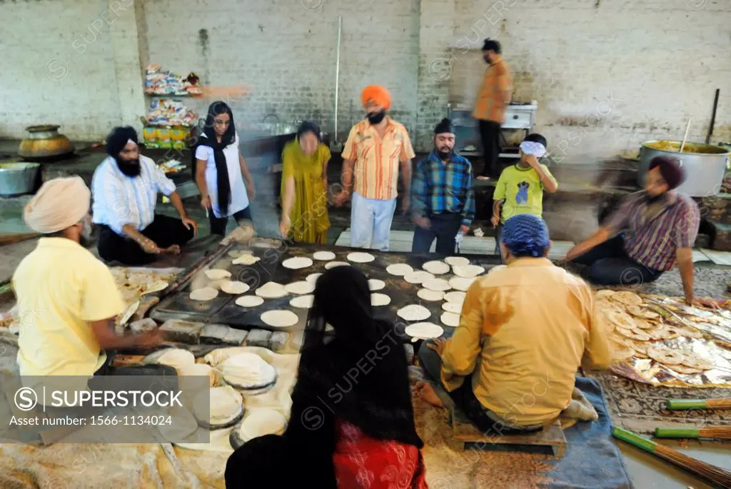 preparation of chapati in the canteen called Langar where food is served in a Gurdwara to all the visitors without distinction of background for free,...