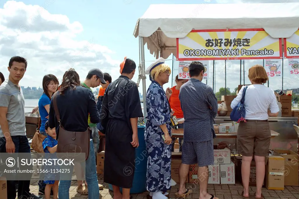Festival goers at an Obon summer festival in Edgewater, NJ The store holds a yearly summer festival inviting customers to their facilities to enjoy tr...