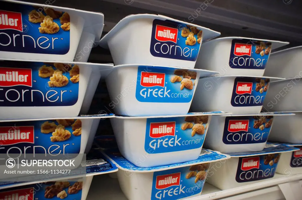 Containers of Müller greek style and traditional yogurt are seen on a supermarket shelf in New York Theo Müller and PepsiCo have a joint venture to br...