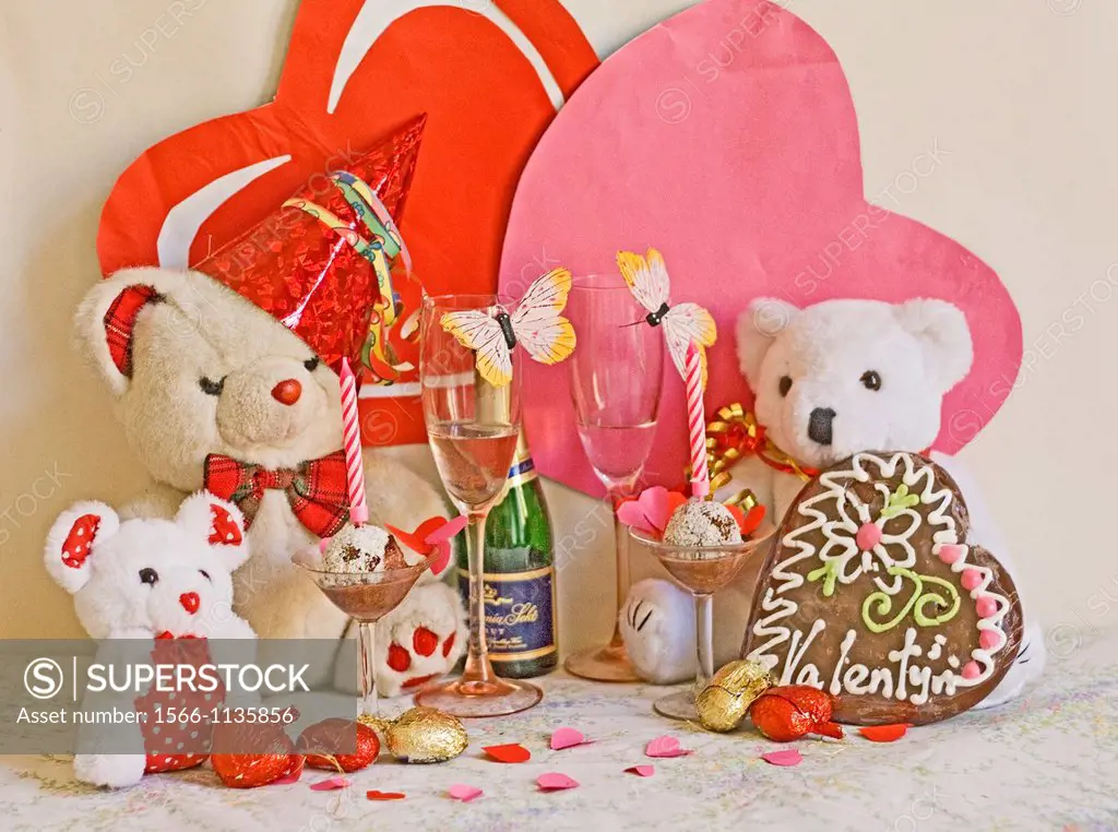 Teddy Bear Anniversary  Fatso Bear shares Valentine or anniversary with a white teddy bear  A small teddy bear is prt of family  There are two tall pi...