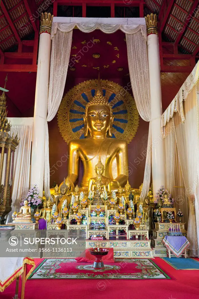 Interior of Wihaan Ordination Hall with Golden Buddha image, Wat Phra Singh, Chiang Mai, Thailand