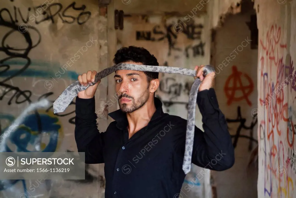 Model posing in rubble of an abandoned house, Valencia, Comunidad Valenciana, Spain, Europe