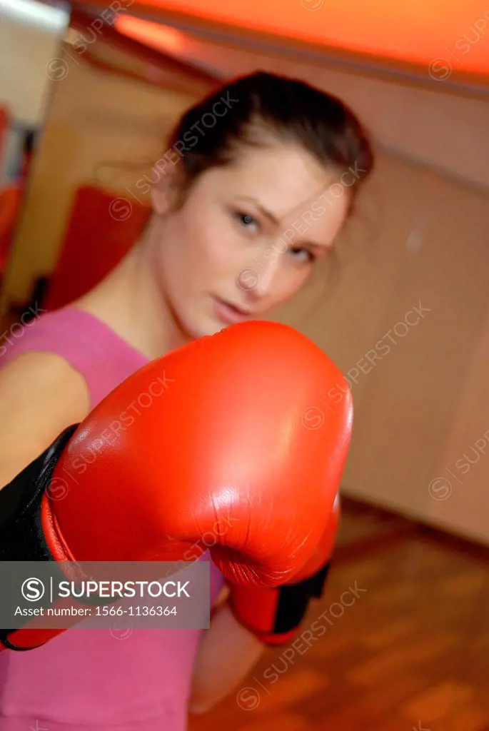 Woman boxing in a gym  The techniques that boxers use to keep fit are often used in a form of exercising known as boxercise