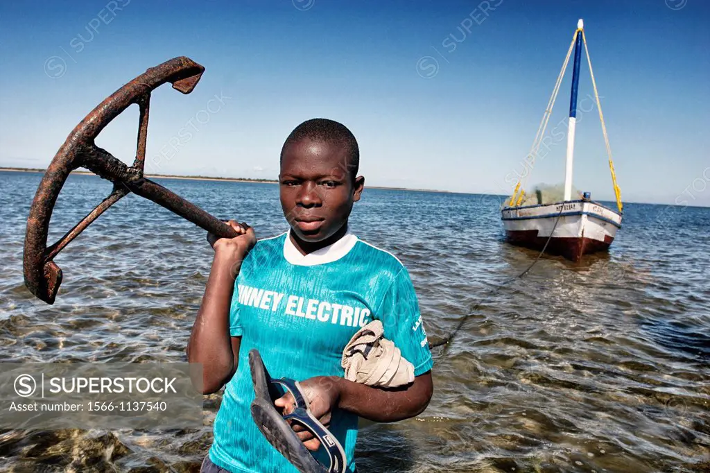 Fisherman at work with anchor, Mozambique, Africa