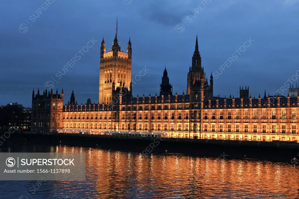 Houses of Parliament and Thames river, cloudy evening, London, England
