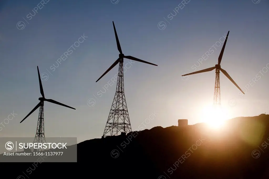 Three windmills at dusk in Tarifa