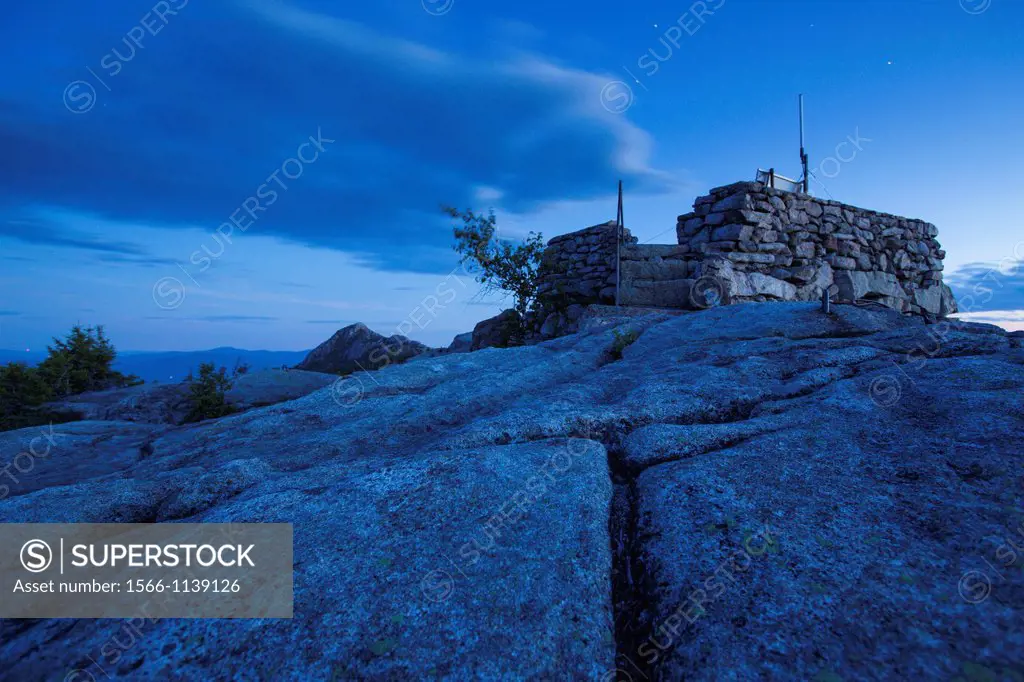 Middle Sister Fire tower on Middle Sister Mountain in Albany, New Hampshire USA during a summer night  This fire tower was in operation from 1927-1948