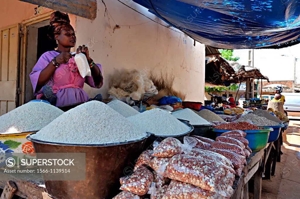 Woman selling food in her street stall in the market  Segou, Mali