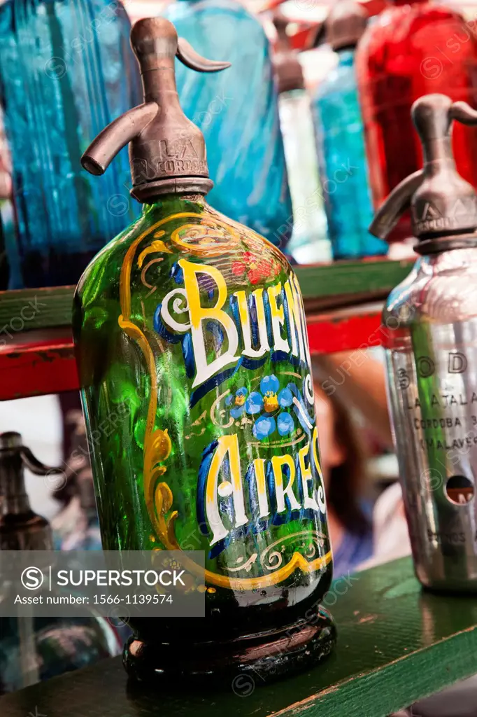 Soda siphons on sale at a stall in Plaza Dorrego during the Sunday Market in San Telmo, Buenos Aires, Argentina