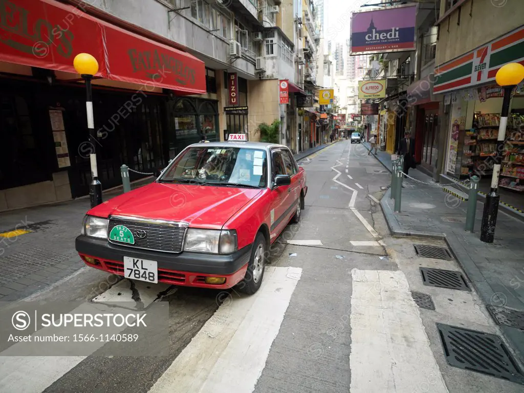 A taxi on a street in Central, Hong Kong