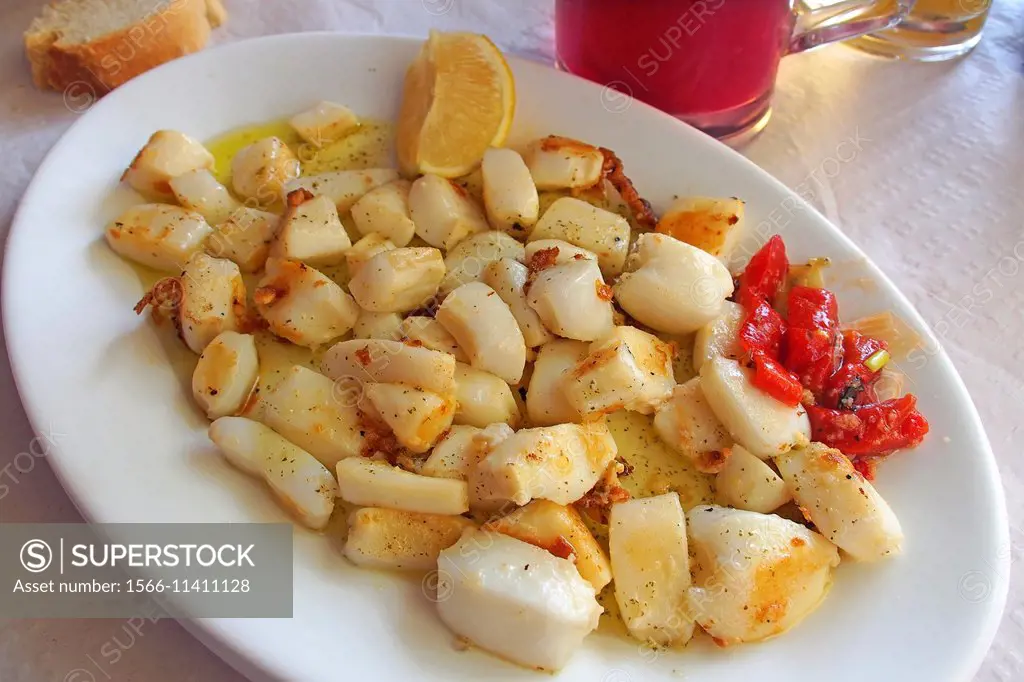 Grilled cuttlefish and ´tinto de verano´ (red wine with lemonade and ice cubes), Spain