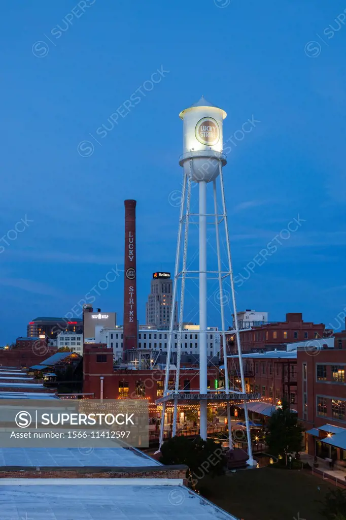 USA, North Carolina, Durham, American Tobacco and City Center Complex, mixed use space in renovated tobacco warehouses, dusk.