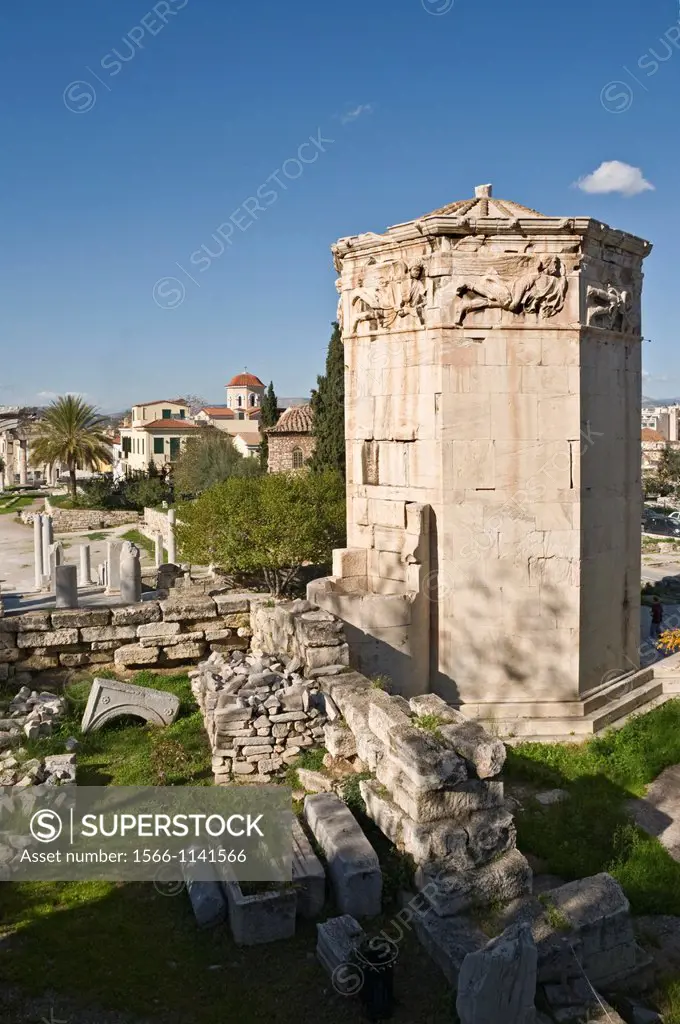 View across the Roman forum with the Tower of the winds in the foreground, in the Plaka district of Athens, Greece