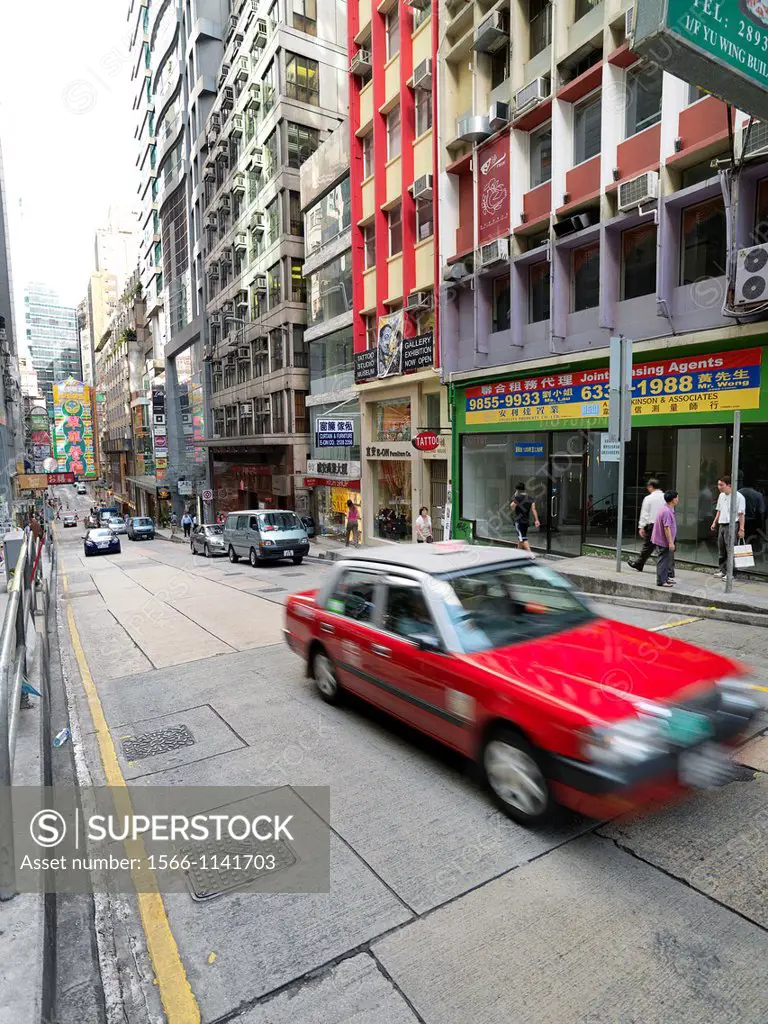 A taxi on a street in Central, Hong Kong
