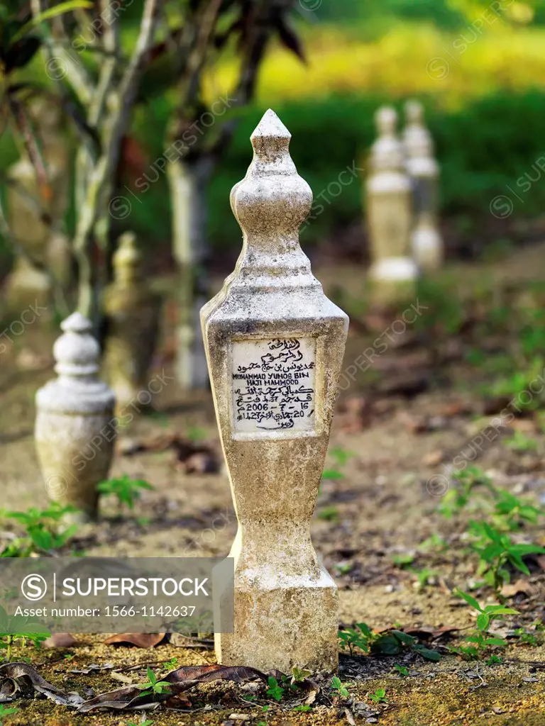 A grave marker in a cemetery located in the costal town of Johor Lama