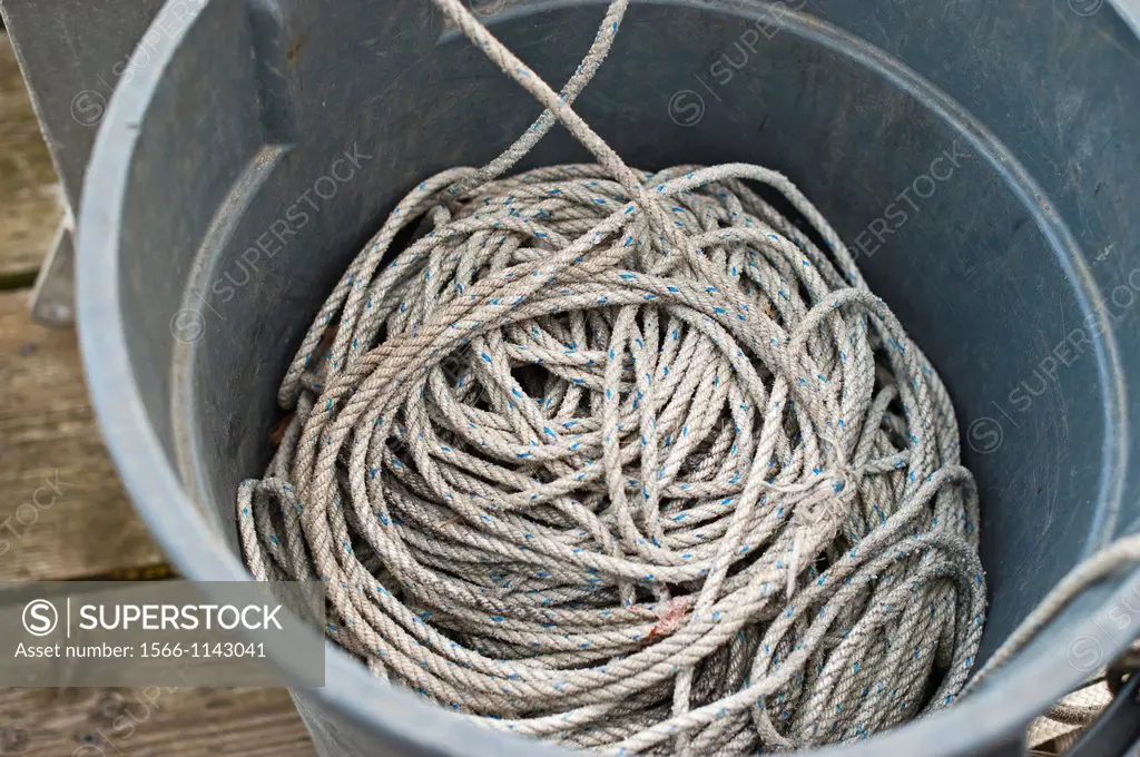 Plastic garbage can filled with rope in Sitka, Alaska, USA