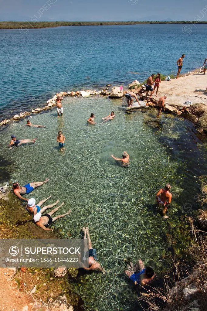 Relaxing in the cold water of Moustos spring. Arcadia, Astros, Peloponnese, Greece.