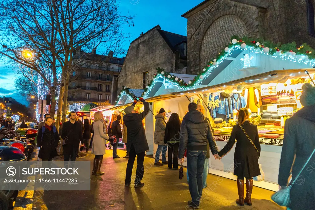 Paris, France, Street Scenes, People Shopping at Christmas Market in Latin Quarter, Saint Germain-des-Prés, at Night.