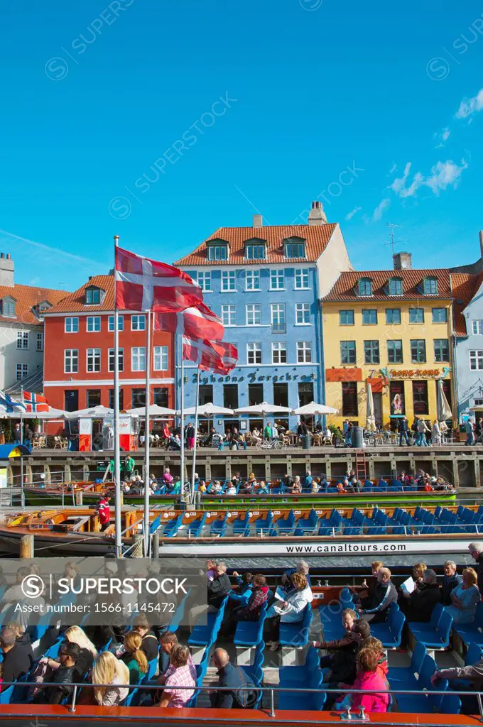 Sightseeing cruise tour boat Nyhavn harbour central Copenhagen Denmark Europe